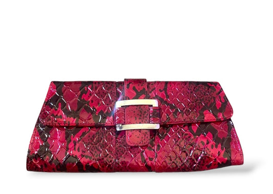 Pink and black faux python clutch