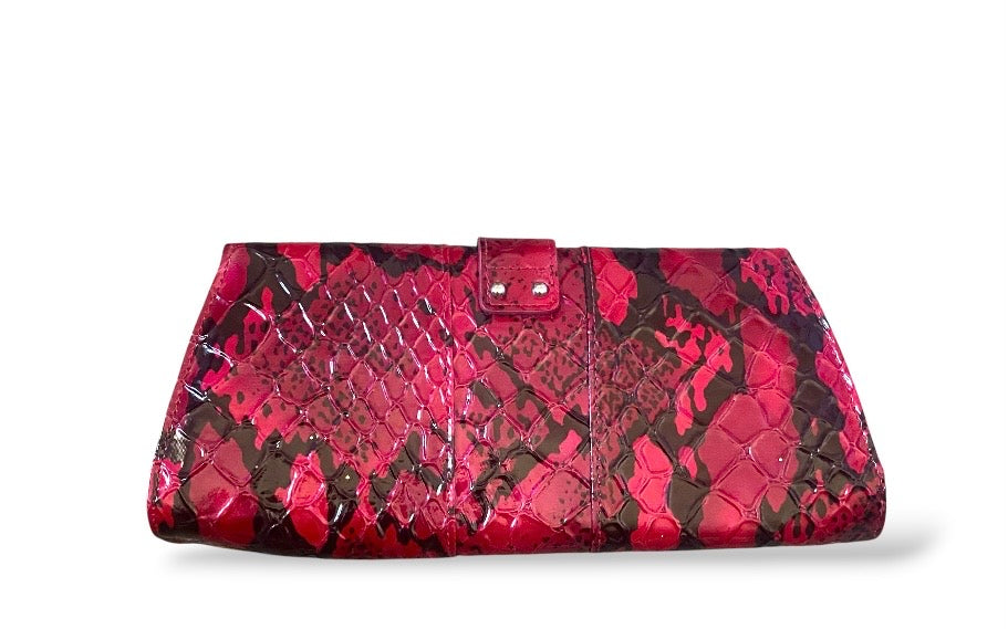 Pink and black faux python clutch